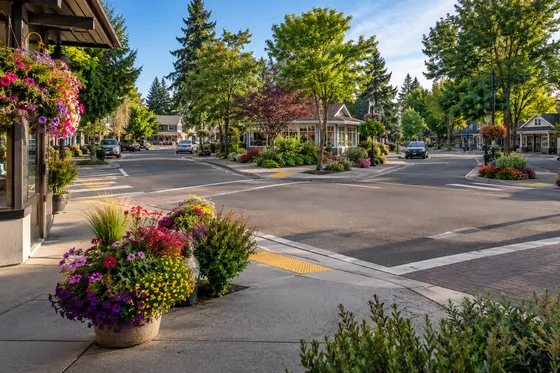 Neighborhood crossroads scene illustrating the Five Corners place name.